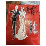 Barbie and Ken trunk with some dolls and clothes