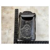 Cast iron mailbox with sunflower on it lid