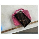 Small tablet in pink bag, unit is untried and