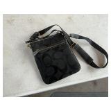 Shoulder bag marked Coach. No claims made as to