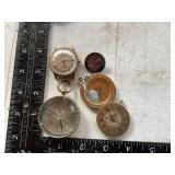 Twenty fifth anniversary singers pin a compass