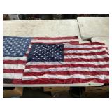 2 nylon American flags previously displayed, in