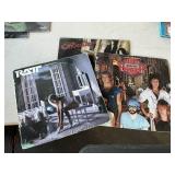 Rat, Night Ranger, and Cinderella record albums