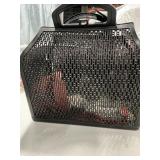 Hard plastic basket with dog, leashes, and other