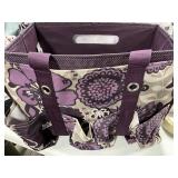 A ï¿½gardenerï¿½sï¿½ bag with a few dog related items