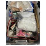 Ribbons and other craft items in a flip top tote