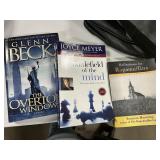 Books and a computer bag