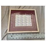 Stamps in a picture frame