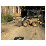 New Holland L665 turbo skid load