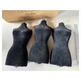 Miniature mannequin missing base has  hole in arm