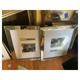 2 mirrored picture frames never installed