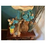 1 candle stick and 3 vases one of which has been