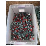 Tote of Red LED pinecone lights for the holiday,