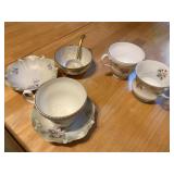 Tea cups and sugar dish