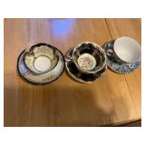 (3) tea cups one has been repaired