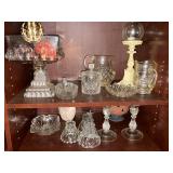 2 shelves of clear glassware