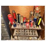 Screw drivers and wooden rack