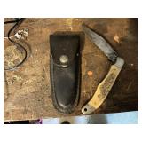 Large Schrade folding knife with sheath