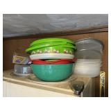 Plastic containers on top of garage fridge