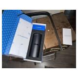 Portable air purifier still in original box