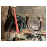 4 Plastic horseshoes and wooden stake, w/ a good