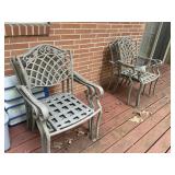 6 patio chairs and a table