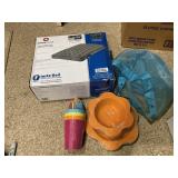 Bag of picnic wear and an air mattress