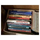 Large box of books, mainly trains