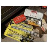 Vintage gun cleaning rods and tins