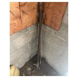(1) T post and (2) pieces of metal