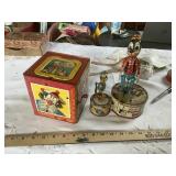 2 older tin toys