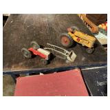2 older toy tractors