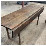 Antique long drop leaf table