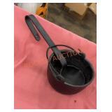Cast iron smelter pot and spoon
