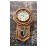 Vintage hanging clock with key