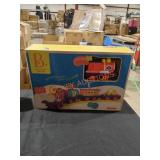 B. The Critter Express Musical Train Toy