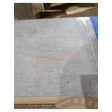 12"x24" delconca grey tile. Aprox 35sqft