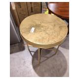 Small gold metal accent table