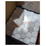 Box of mosaic tiles