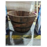 Large wooden barrel planter