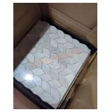 Box of decorative mosaic tiles