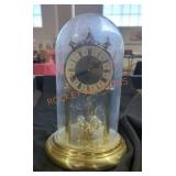 Vintage quartz anniversary clock with glass dome