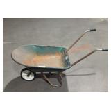 Vintage metal wheel barrow