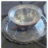 Metal serving plates and bowl with glass bowl
