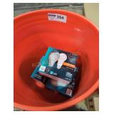Orange 5 gal bucket and 4 boxes eco smart bulbs