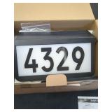 Solar powered address sign