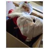 Giant Santa head is broke off pieces missing