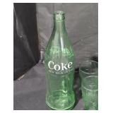 Vintage coca-cola glasses and bottle.
