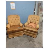 Pair of vintage swivel rocker chairs.