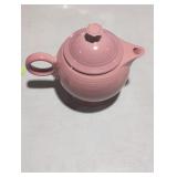 Pink fiesta ware ceramic pitcher.